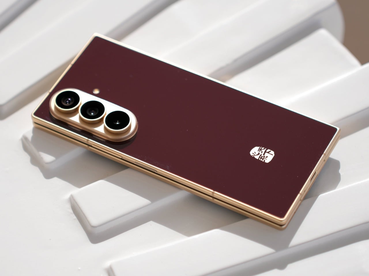 Samsung's W27 Is a $2,850 Gilded Foldable — and the Anti-iPhone Duo